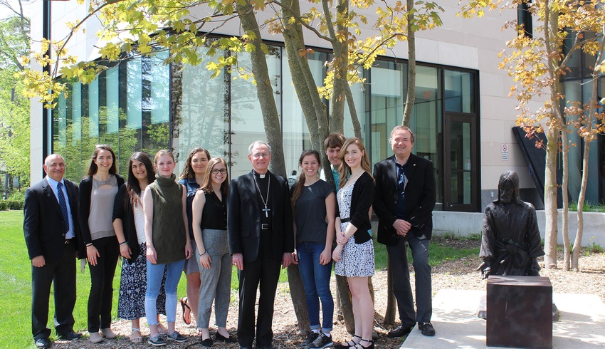Students in Catholic Studies for Teachers enjoy visit with Bishop