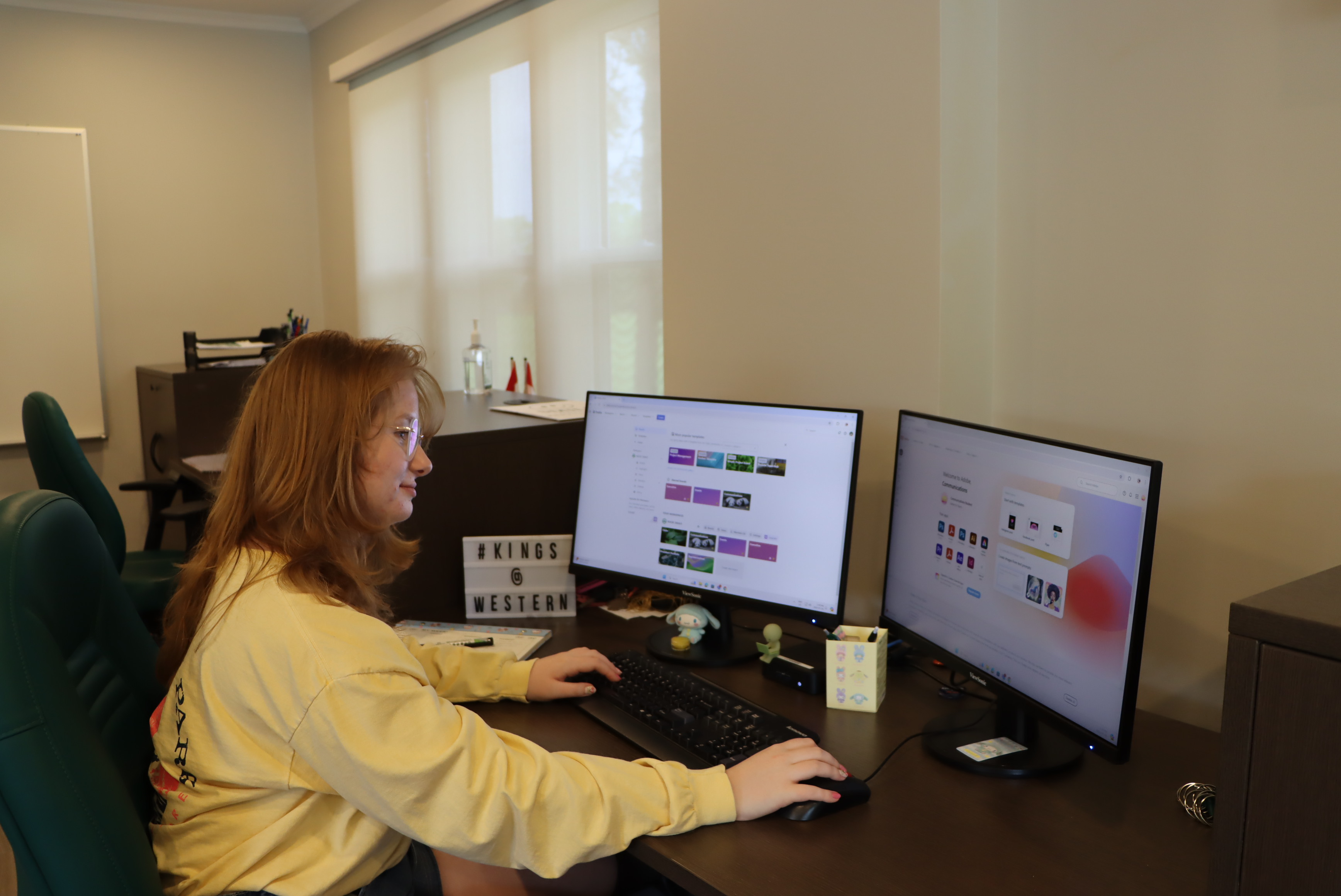 Student researcher working on a computer
