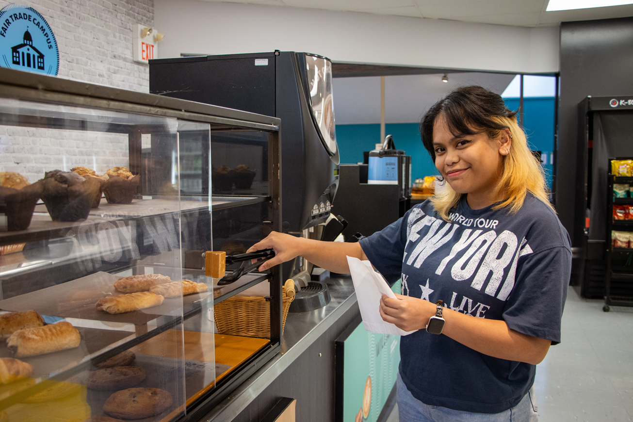 Student in Thames Market in Wemple Hall
